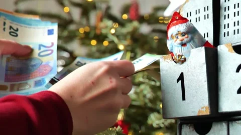 Spending on Christmas sweets, calendars, and gifts. Stock Footage 346175633