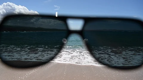 Spending a day at the beach through sunglasses Stock Footage 126431422
