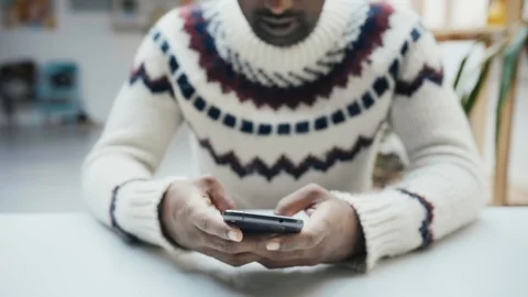 Spending free time with smartphone and chat or scrolling social network web app Stock Footage 100002657