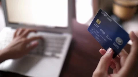 Spending money on internet security numbers and registration or debit Stock Footage 265931848