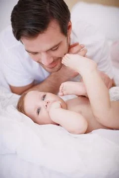 Spending special time together. A devoted young dad spending time with his baby Stock Photos