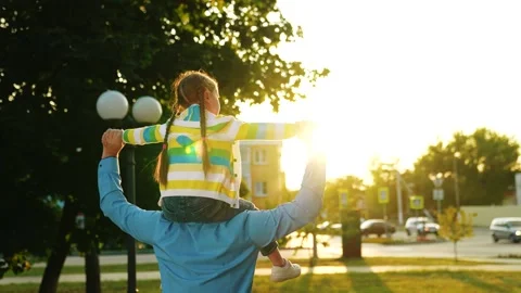 Spending time together, walk kindergarten, superhero, little schoolgirl walk dad Stock Footage 263939375
