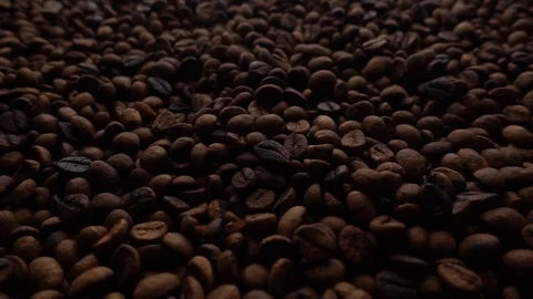 Spewing roasted coffe beans to a pile of coffe Video stock 116290338