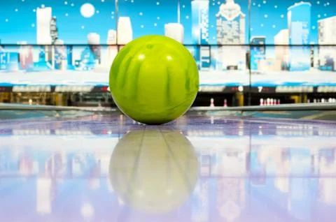 Sphere ball standing on bowling lane Stock Photos