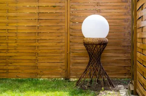 A sphere on a hyperboloid support structure. Stock Photos