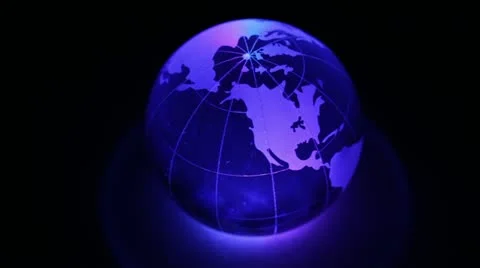 Sphere spins with world map on it and color illumination Stock Footage 10852624