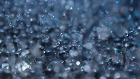 Spheres bouncing in water Stock Footage 165031696