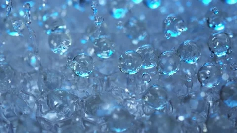 Spheres getting washed and water splashes in slow motion Stock Footage 165043301
