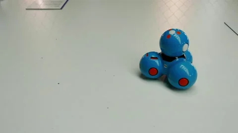 Spheric robot moving on a table, looking aroun him and going away the frame Stock Footage 67250658