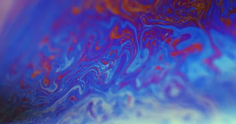 Spherical abstraction of iridescent blue, yellow and red colors with soft focus Stock Footage 332371909