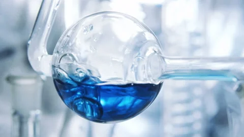 Spherical flask. Boiling and air bubbles Stock Footage 238831373