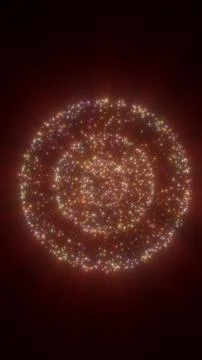 Spherical formation of multicolored glowing particles radiating light on a .. Stock Photos