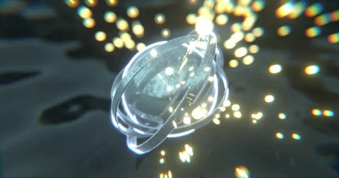 Spherical metallic object with rings rotates emitting luminous particles Stock Footage 160627053