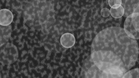 Spherical objects in motion against a complex background pattern viewed from dir Видео 328806793