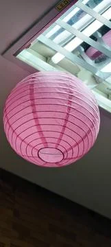 A spherical pink paper lantern Stock Photos