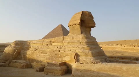 Sphinx and Cheops pyramid in Giza Cairo Egypt Stock Footage