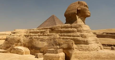 Sphinx and great pyramids Stock Photos