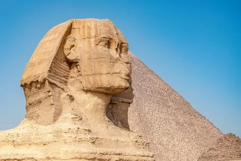 .Sphinx on blue sky background Stock Photos