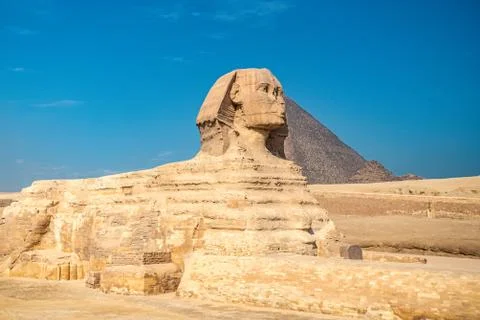 .Sphinx on blue sky background Stock Photos