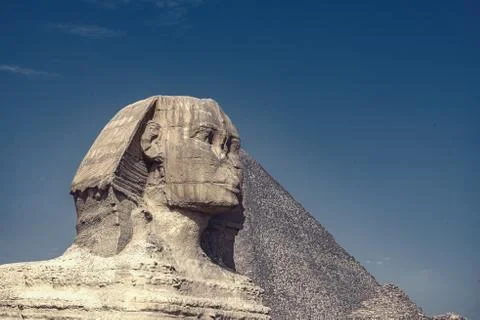 .Sphinx on blue sky background Stock Photos