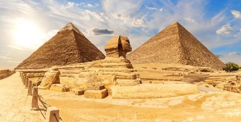 The Sphinx in front of Pyramids of Egypt, beautiful panoramic view Stock Photos