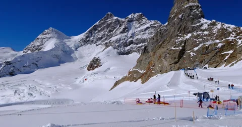 Sphinx Observatory and Snow Fun Park with tourists at Jungfraujoch, Switzerland Stock Footage 326198037