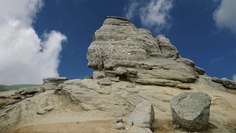 The Sphinx Rock (Sfinxul) in Bucegi Mountains, Romania Stock Footage 100957786