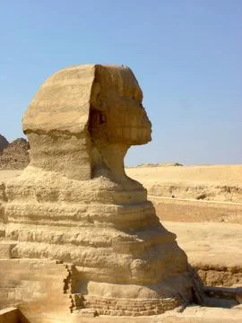 The Sphinx Stands Majestically Against the Pyramids of Giza in Egypt Under .. Stock Photos
