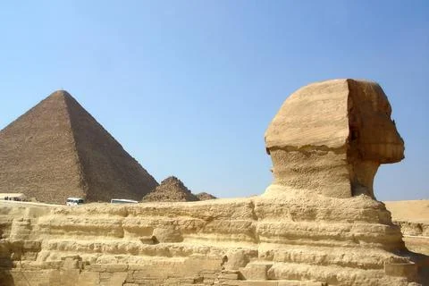 Sphinx Stands Majestically With the Pyramids of Giza in the Background Unde.. Stock Photos