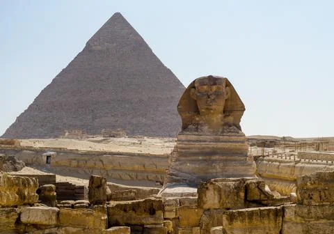Sphinx statue and Cheops pyramid in Giza Egypt Stock Photos