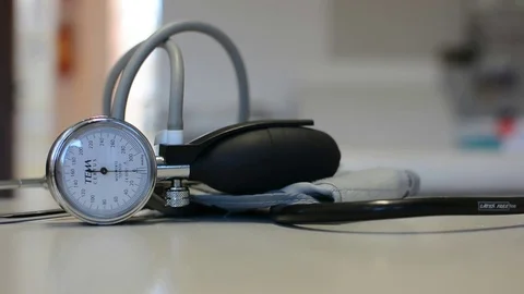 Sphygmomanometer resting on the table of the infirmary Stock Footage 82322610