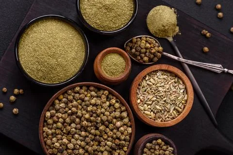 Spice dried dill or basil in the form of green powder. Asian cuisine Stock Photos