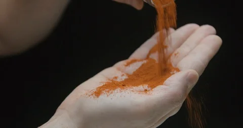 Spice paprika in hand studio Stock Footage 91353916