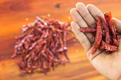 Spice pepper on hand Stock Photos