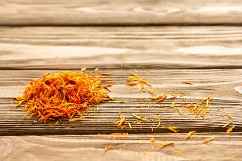 Spice saffron on the table. Close-up. Stock Photos