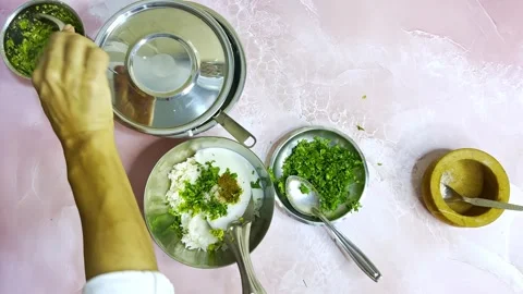 Spiced Curd Rice Hand Mixed in Traditional Indian Kitchen Stock Footage 305960873
