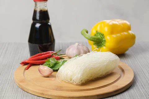 Spices and assorted vegetables are ready to cook with Chinese glass noodles. 스톡 사진