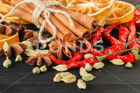 Spices and herbs on old kitchen table. Food and cuisine ingredients. Stock-Fotos