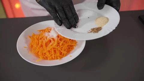 Spices are put in carrots Stock Footage 268577444