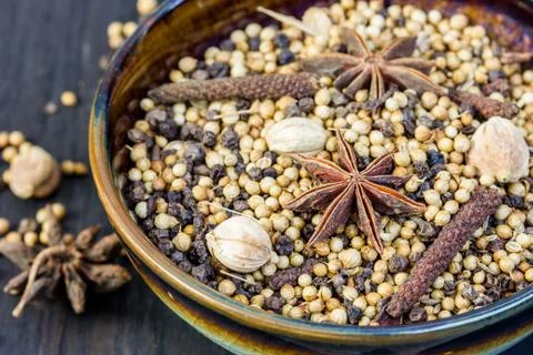 Spices in a ceramic dish Stock Photos