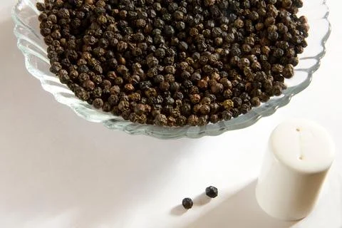 Spices, dry black peppercorns kali mirch piper nigrum piper longum with shake Stock-Fotos