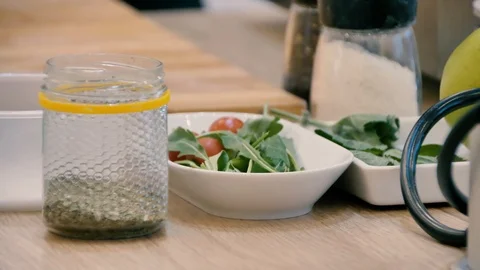 Spices green salad on the table, camera movement Stock Footage 125921752