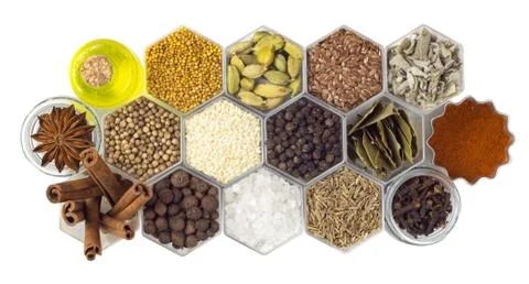 Spices in hexagonal jars isolated on a white background Stock Photos