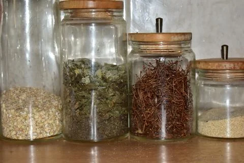 Spices in jars in the kitchen  Stock Photos