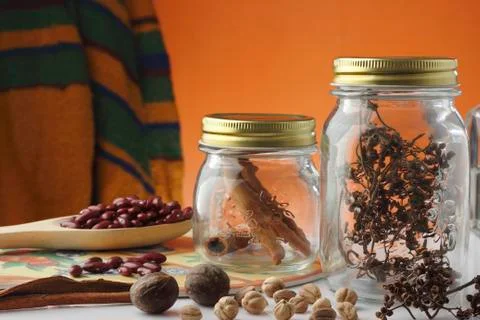 Spices jars on table kitchen Stock Photos