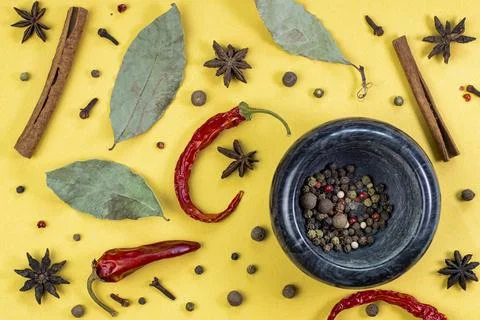Spices pattern on yellow, top view, flat lay, copy space Stock Photos