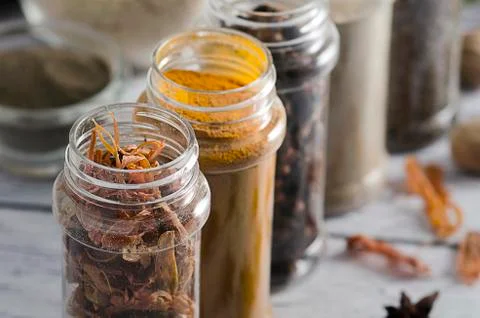 Spices on plastic kitchen condiment. Close up. lid open. Stock Photos