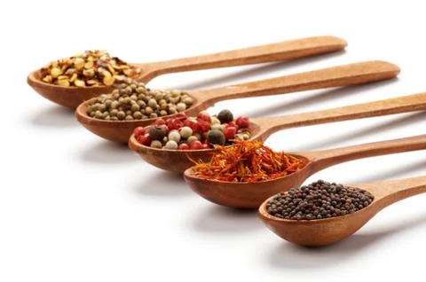 Spices in spoon Stock Photos