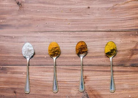 Spices In Spoon Stock Photos