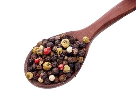 Spices in the spoons isolated on white Stock Photos